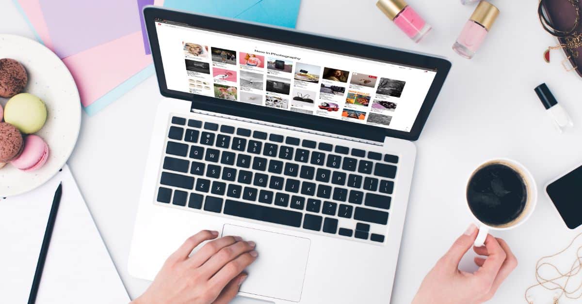 laptop on desk with computer screen on Pinterest website